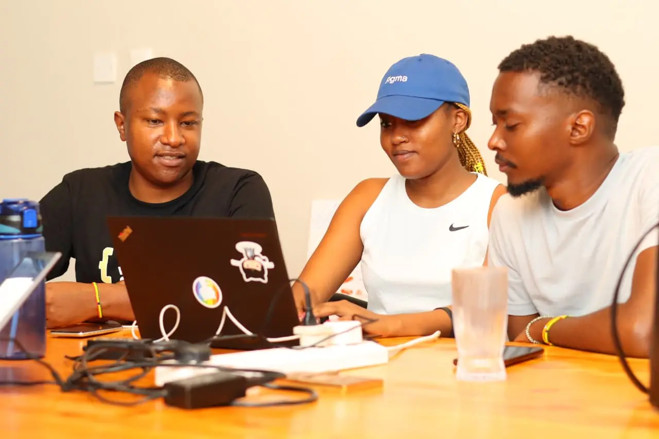 The same editing session a moment later — one frame chosen, another argued for